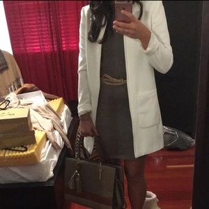 White textured light overcoat